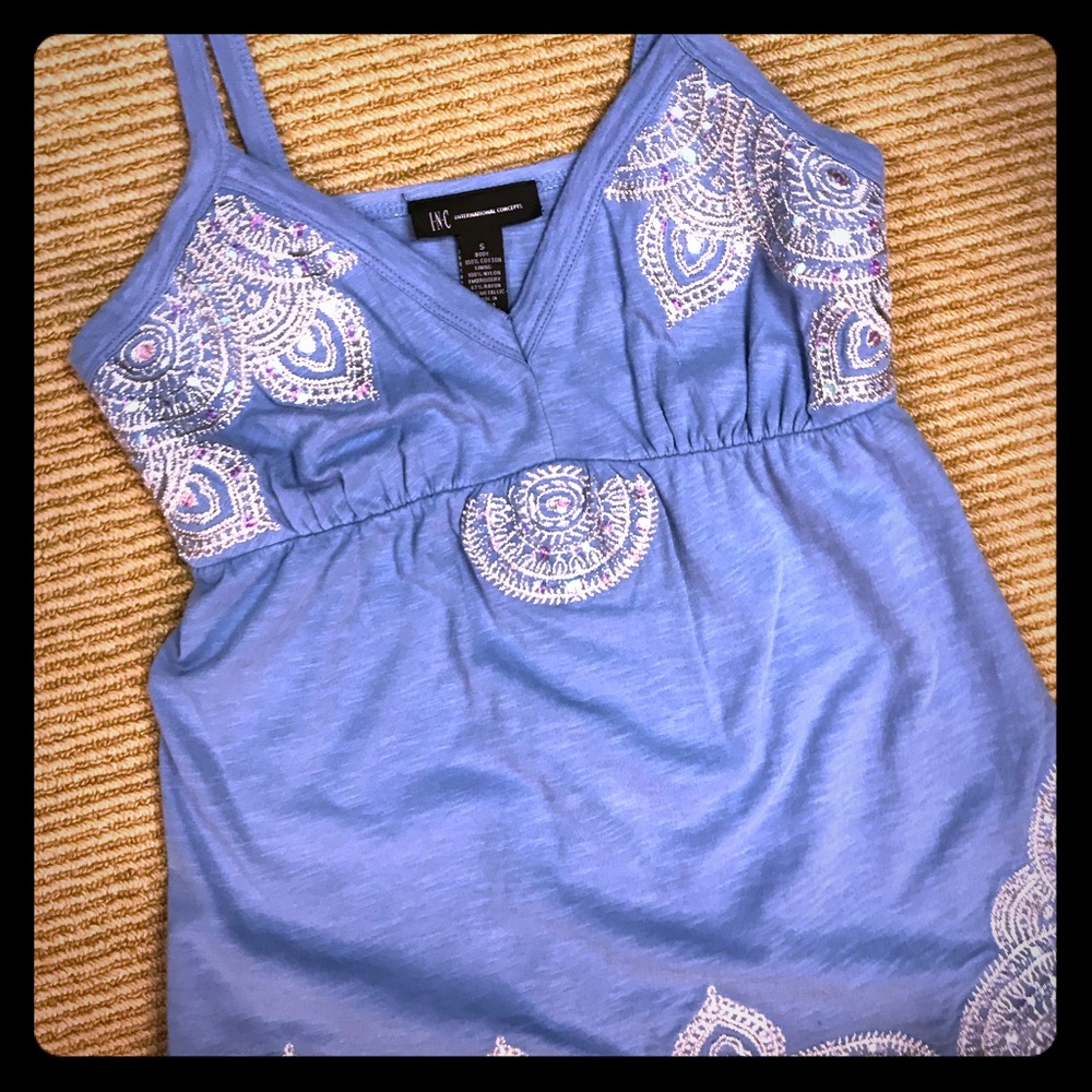 Embroidered top.